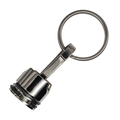 R73225 - Brelok metalowy Piston, srebrny 